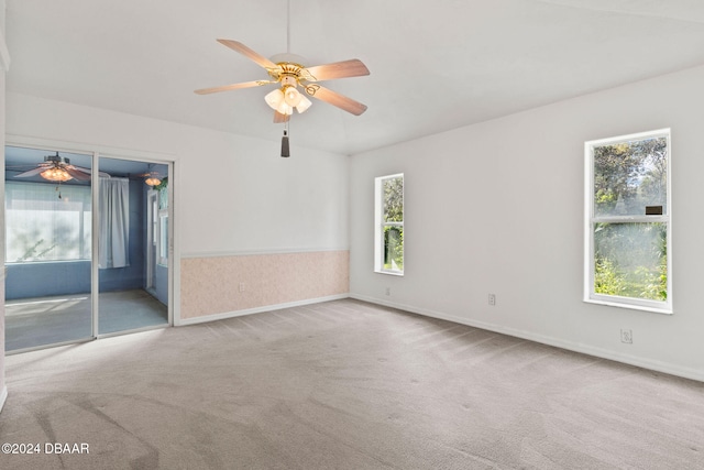 carpeted empty room with ceiling fan