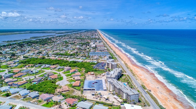 aerial view featuring a beach view and a water view