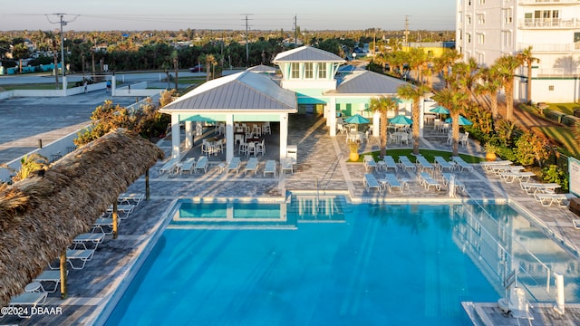 view of swimming pool featuring a patio