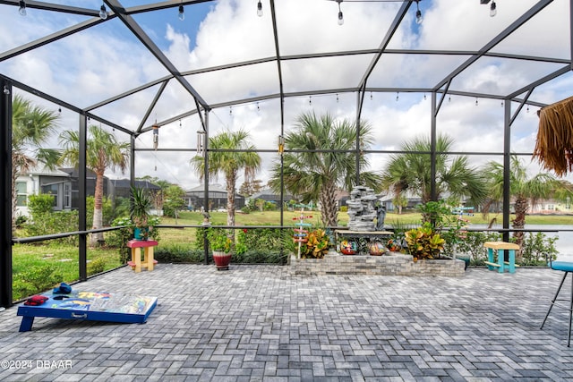 view of patio / terrace with glass enclosure