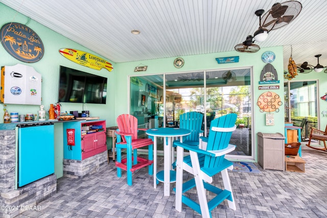 view of patio / terrace with ceiling fan