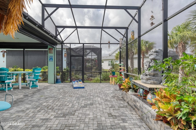 view of patio / terrace with glass enclosure