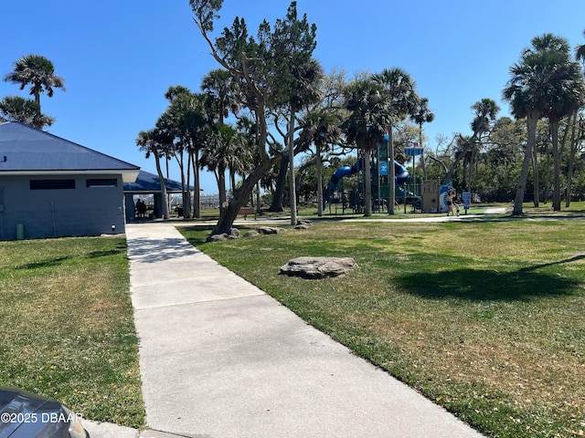 1801 James St, South Daytona, FL 32119 - view of property's community with a lawn
