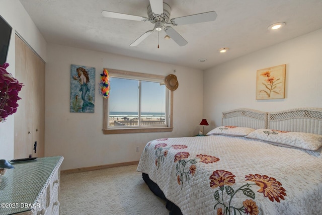 bedroom with ceiling fan, recessed lighting, carpet flooring, and baseboards