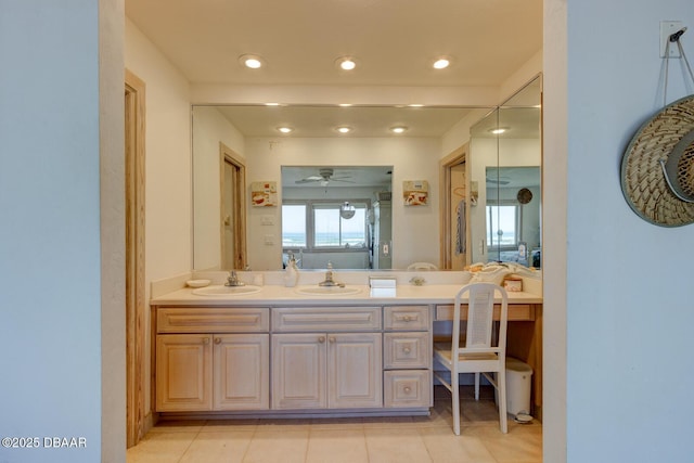 bathroom with recessed lighting, connected bathroom, vanity, and tile patterned floors