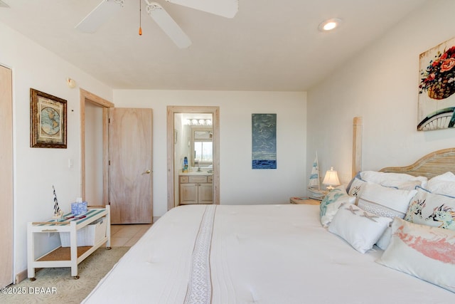 bedroom with ensuite bath, a ceiling fan, and recessed lighting