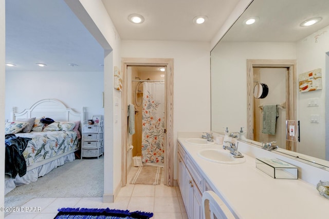 full bathroom featuring a shower with curtain, connected bathroom, a sink, and recessed lighting