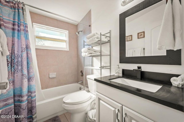 full bathroom with toilet, shower / bath combo with shower curtain, vanity, and tile patterned flooring