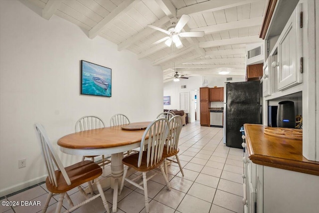 dining area featuring vaulted ceiling with beams, ceiling fan, light tile patterned floors, and wood ceiling