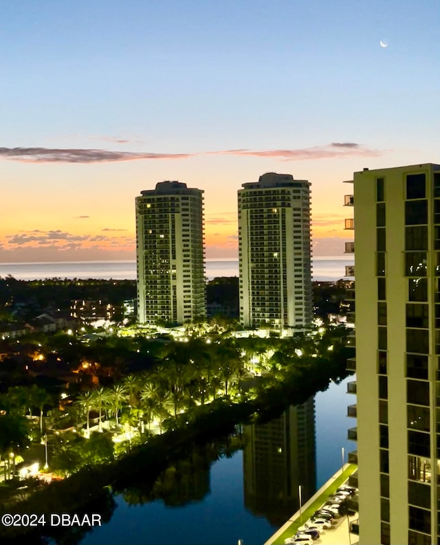 property's view of city featuring a water view