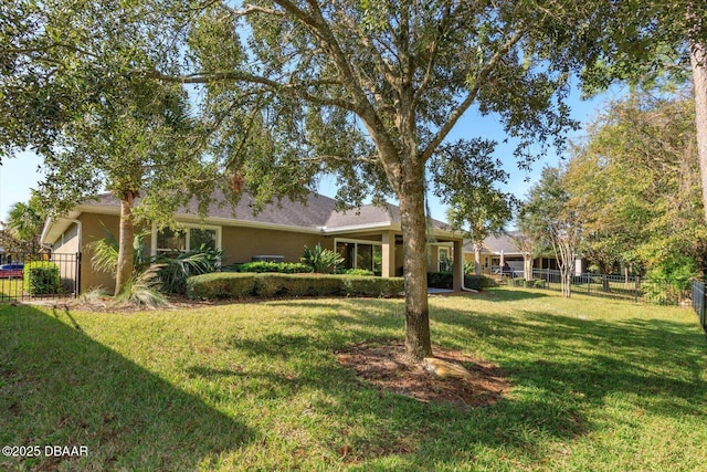 ranch-style house with a front lawn