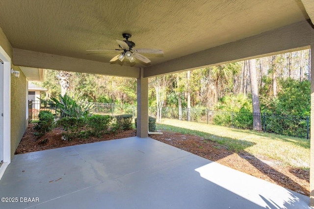 view of patio featuring ceiling fan