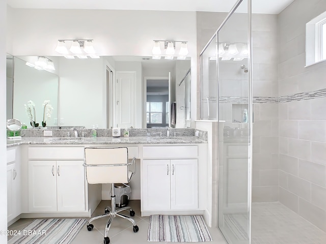 bathroom with vanity and an enclosed shower