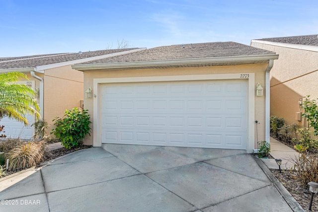 garage with driveway