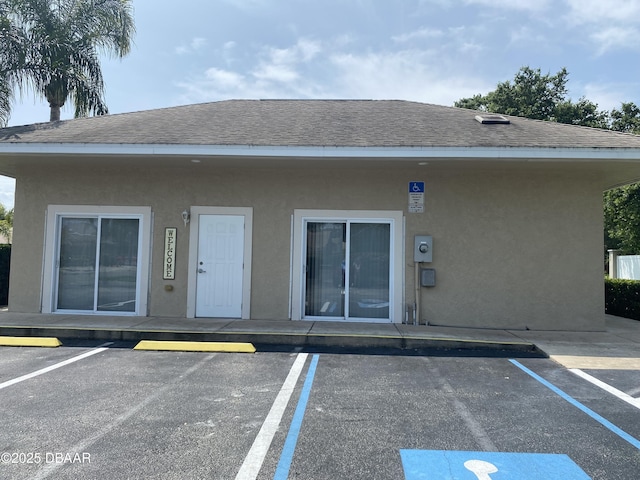 2273 Hawks Cove Cir, New Smyrna Beach, FL 32168 - view of building exterior with uncovered parking