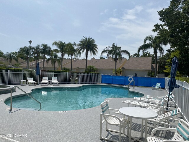 2273 Hawks Cove Cir, New Smyrna Beach, FL 32168 - community pool featuring a patio area