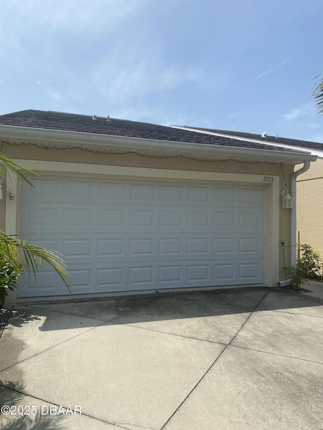 2273 Hawks Cove Cir, New Smyrna Beach, FL 32168 - garage with driveway
