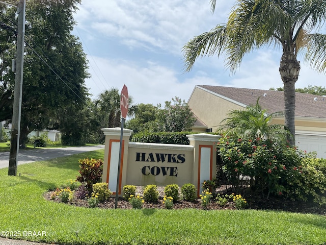 2273 Hawks Cove Cir, New Smyrna Beach, FL 32168 - community sign with a yard