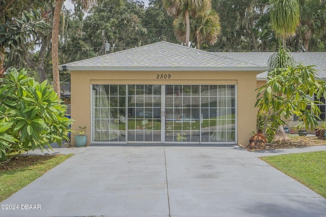 exterior space with a garage