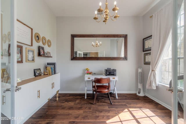 office featuring dark wood-type flooring, plenty of natural light, and a notable chandelier