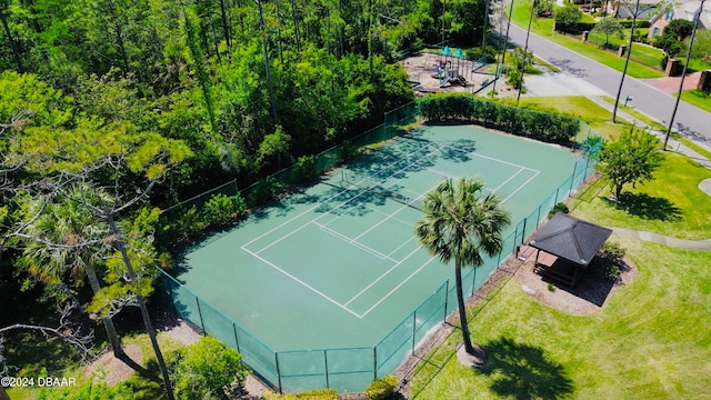 view of sport court with a playground, tennis court, and a yard