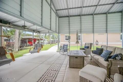 view of patio featuring a carport