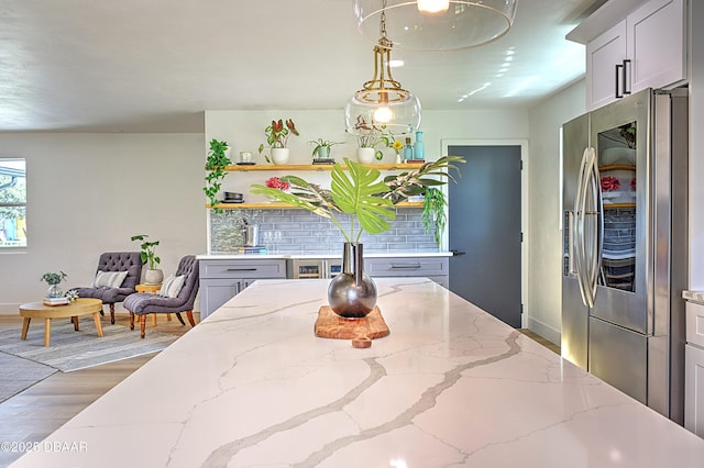550 Eagle Dr, Holly Hill, FL 32117 - dining area featuring baseboards and light wood-type flooring