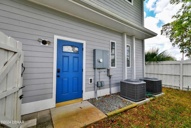 property entrance with central AC unit