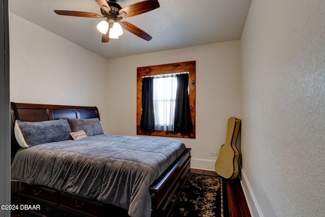 bedroom featuring hardwood / wood-style floors and ceiling fan