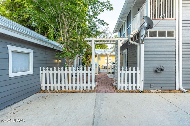 exterior space featuring a pergola