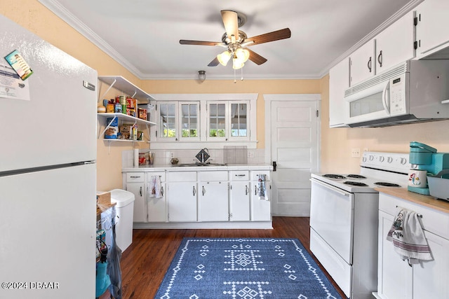 kitchen with white cabinetry, dark wood-type flooring, ornamental molding, and white appliances