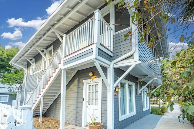 view of property exterior featuring a balcony