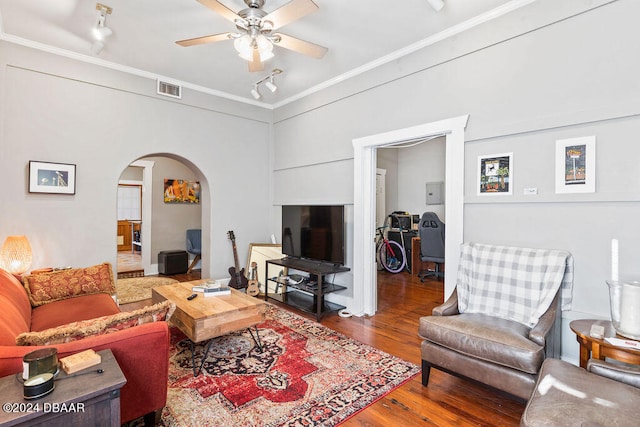 living room with ceiling fan, hardwood / wood-style floors, and ornamental molding