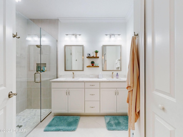 bathroom featuring crown molding, tile patterned floors, vanity, and an enclosed shower