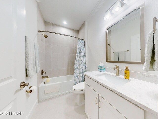 full bathroom featuring shower / bath combo, vanity, tile patterned floors, and toilet