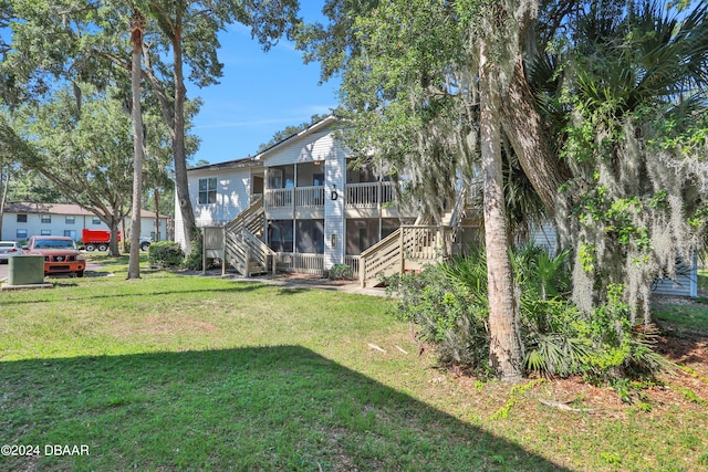 view of yard with a wooden deck