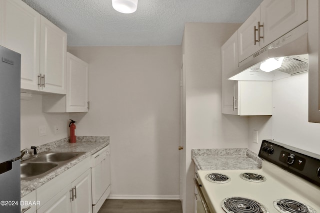 kitchen featuring white cabinetry, white appliances, sink, and wood-type flooring