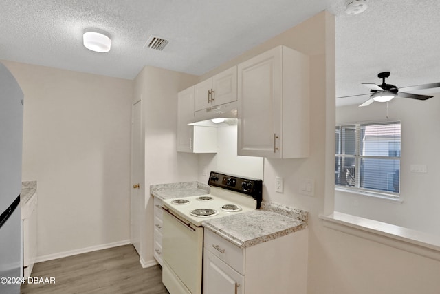 kitchen with a textured ceiling, light hardwood / wood-style floors, white cabinets, white appliances, and ceiling fan