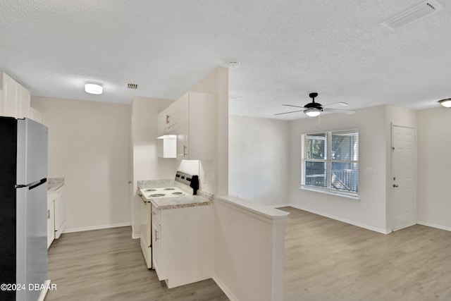 kitchen featuring light hardwood / wood-style floors, white cabinetry, ceiling fan, white range with electric cooktop, and fridge