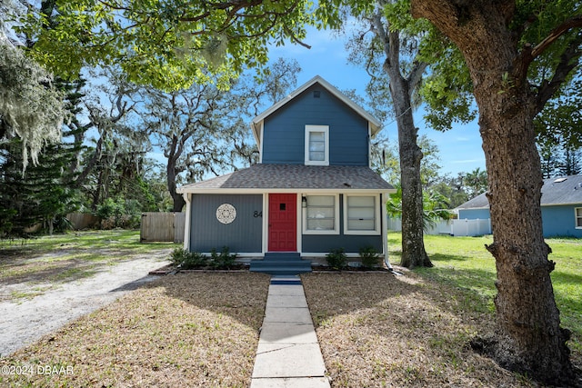 view of front of home with a front lawn