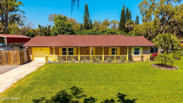 single story home featuring brick siding, covered porch, concrete driveway, and a front yard