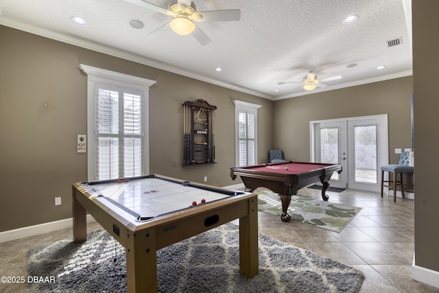 recreation room featuring light tile patterned floors, crown molding, billiards, a textured ceiling, and french doors