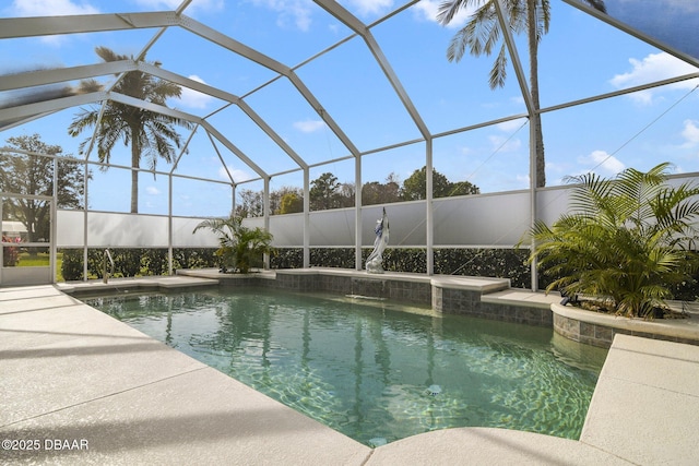 view of pool with a lanai and a patio area