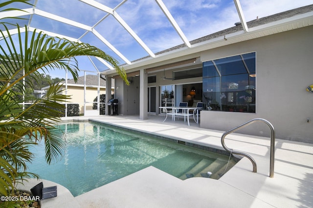 view of pool featuring a lanai and a patio area