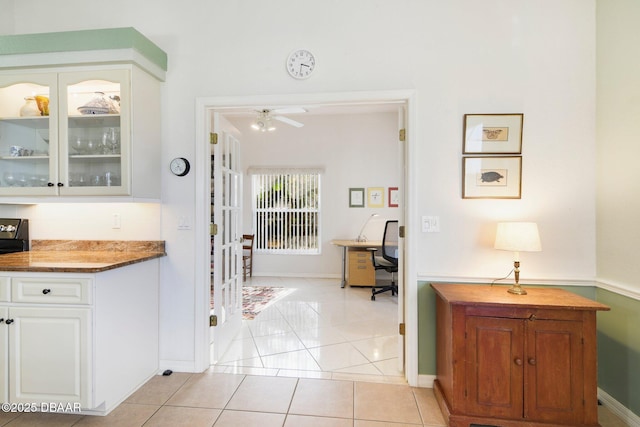 interior space with light tile patterned floors