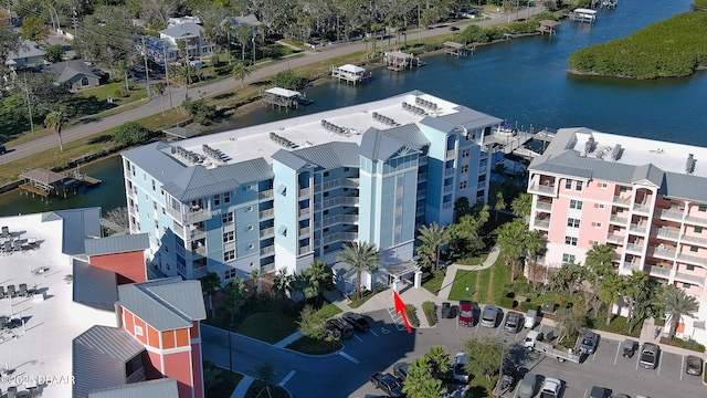 drone / aerial view with a water view