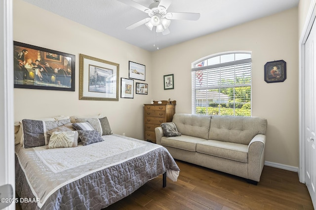 73 Foxhall Ln, Palm Coast, FL 32137 - bedroom with wood finished floors, baseboards, and a ceiling fan