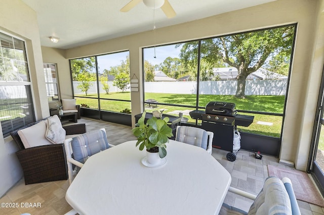 73 Foxhall Ln, Palm Coast, FL 32137 - sunroom / solarium with a ceiling fan
