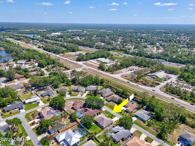 73 Foxhall Ln, Palm Coast, FL 32137 - aerial view of residential area with a large body of water