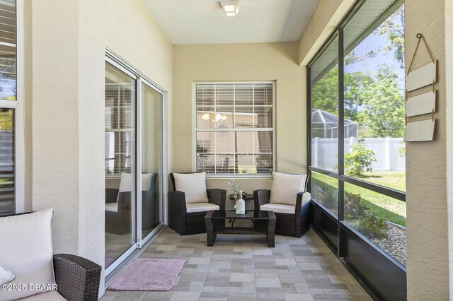 73 Foxhall Ln, Palm Coast, FL 32137 - sunroom featuring plenty of natural light